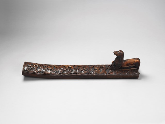 Norwegian mangle board by the anonymous 'Master of the lion' with acanthus leaves and a royal crown, a model that would be copied by other craftsmen, circa 1840 (former W.J. Shepherd Collection)